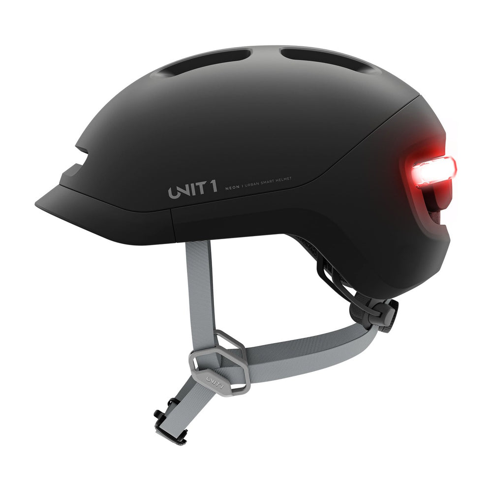 Casque connecté Unit 1 NEON Mips, coloris Charcoal Black, vue de profil, feu arrière allumé