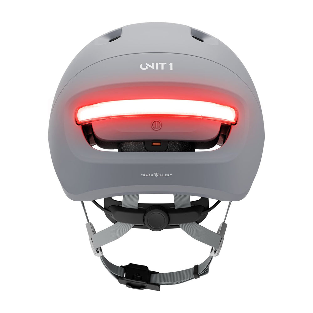 Casque connecté Unit 1 NEON Mips, coloris Mineral Gray, vue arrière, feu allumé