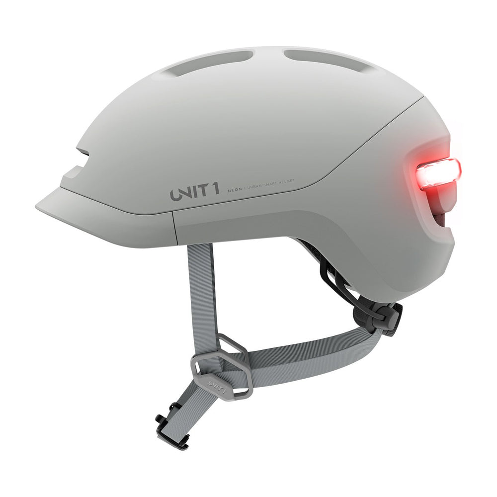 Casque connecté Unit 1 NEON Mips, coloris Slate Gray, vue de profil, feu arrière allumé
