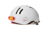 Casque Vélo Thousand Chapter Supermoon Blanc Vue de 3/4 Arrière avec Lumière Aimantée Allumée
