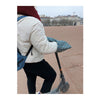 Manchons trottinette Suzon & Suzette - Paulette – Vert Ethnique – portés sur le guidon d'une trottinette