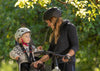 Parent et enfant en balade à vélo avec le siège Hamax Zenith Relax
