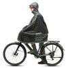 Cape de pluie vélo Tucano Urbano Garibaldina Zeta noire portée sur un vélo de ville, de profil
